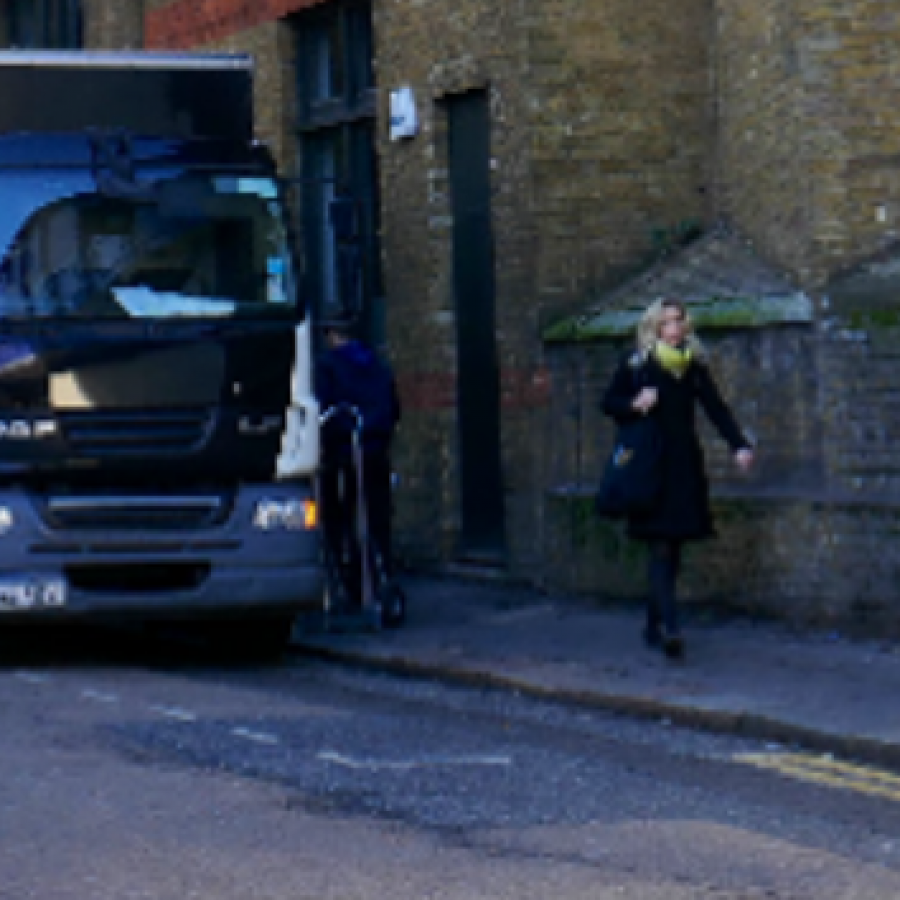 Lorry parked up in sandell street as people walk by