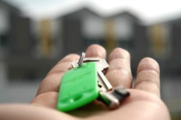 A set of keys in a person's hand