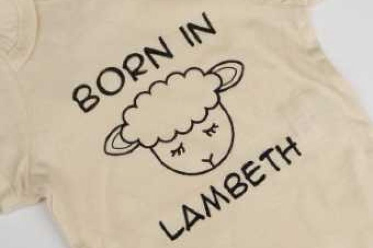 Born in Lambeth undated lamb bodysuit in natural - close up