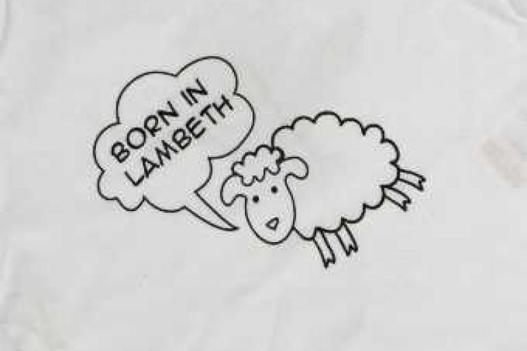 Born in Lambeth undated sheep bodysuit in white - close up
