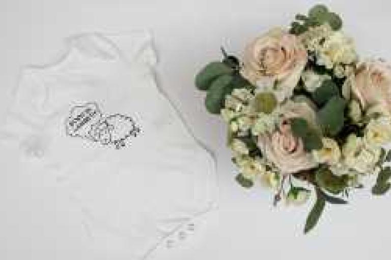 Born in Lambeth sheep bodysuit in white with flowers