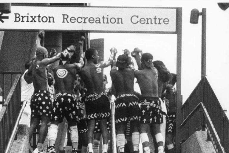 Archive images of people stood on the steps at Brixton Rec Centre