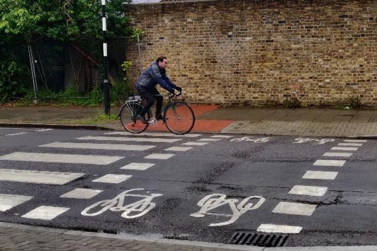 Man cycles on parallel crossing