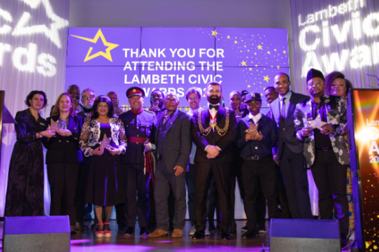 Lambeth Civic Award winners on stage with Lambeth CEO and Mayor at ceremony