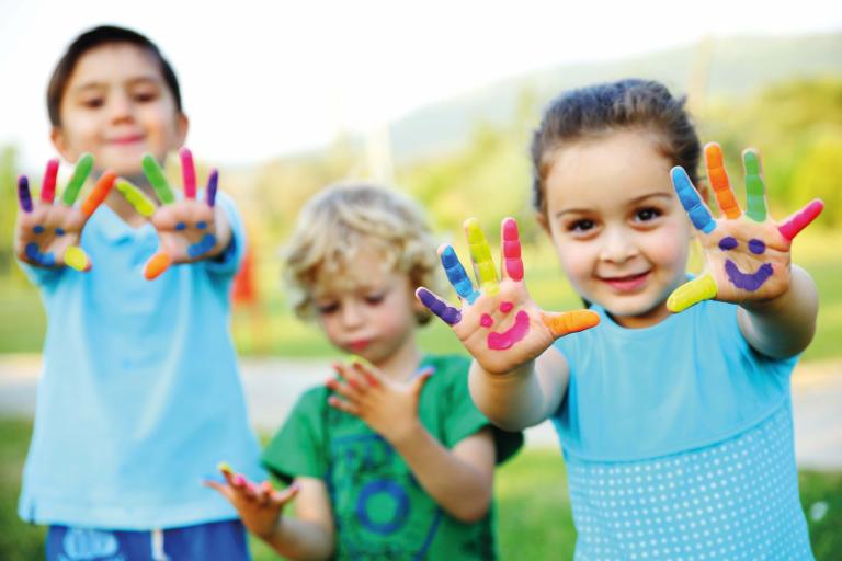 Children with painted hands