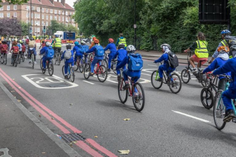 Primary school pupils cycling through Lambeth
