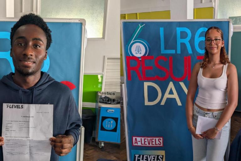 Students hold results for photo