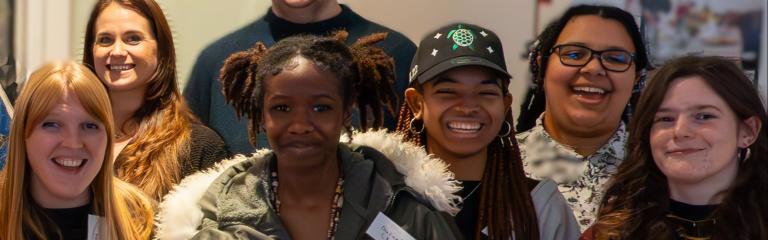 Group of young people smiling at the camera