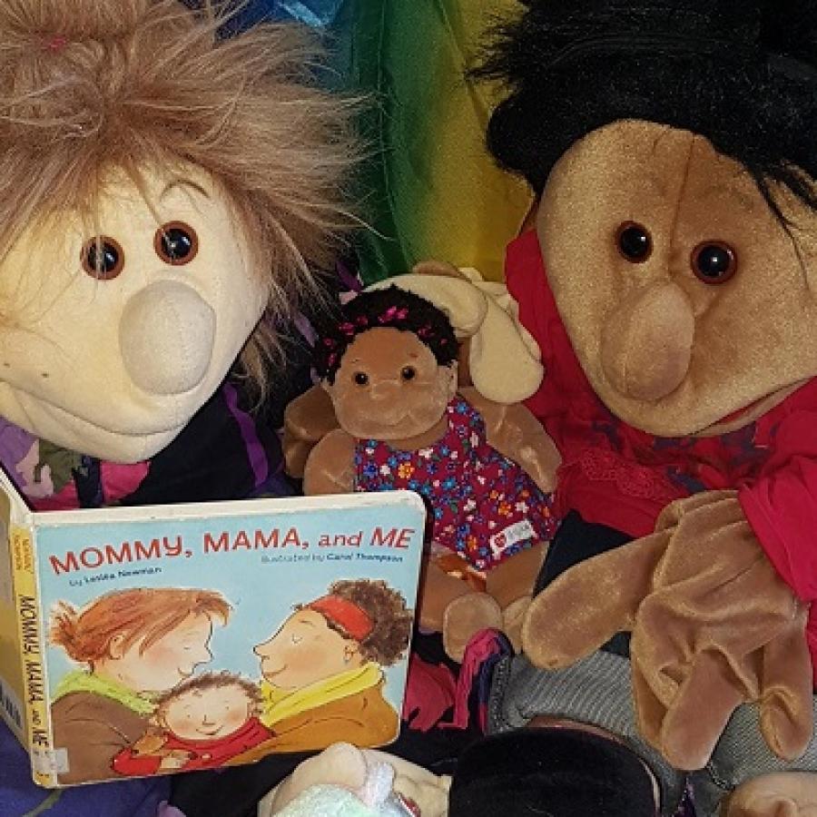 toys reading from a book for children