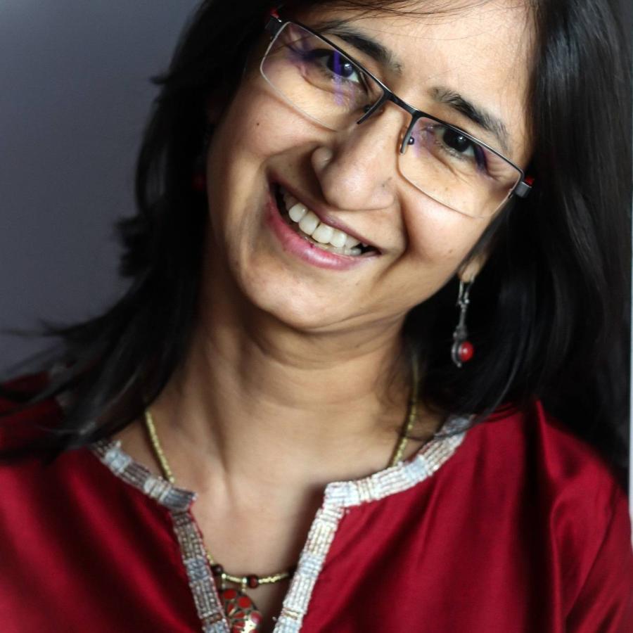 Chitra smiling and posing for the camera