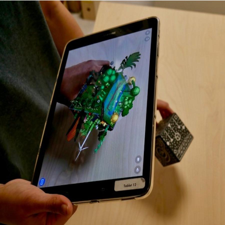 Child holding tablet