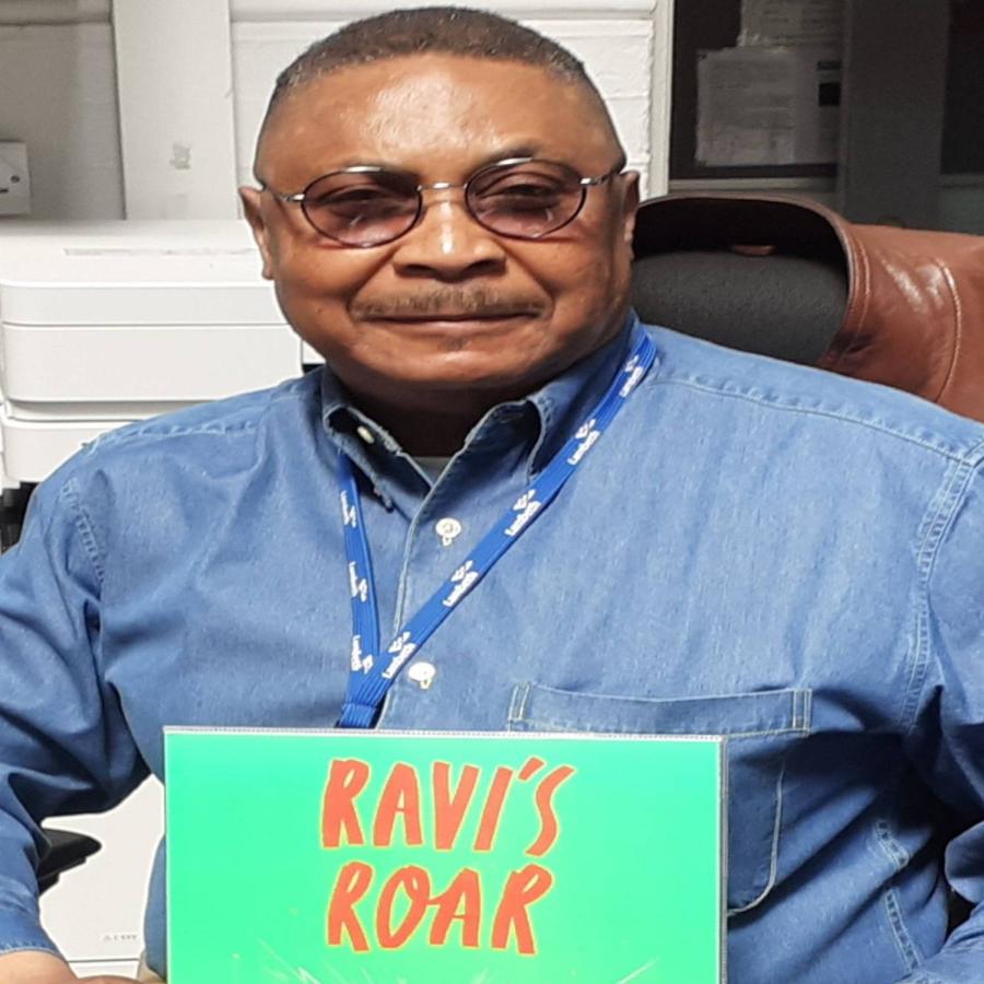 Edwin displaying a book