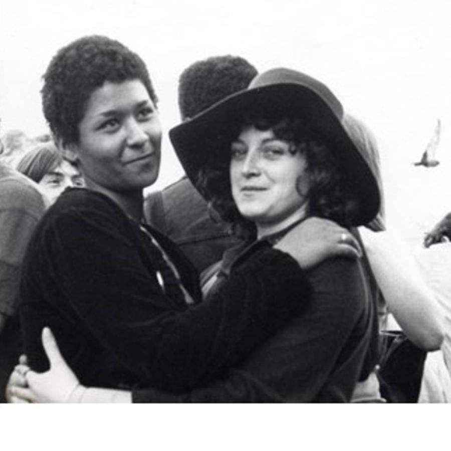 a photo of two women cuddling
