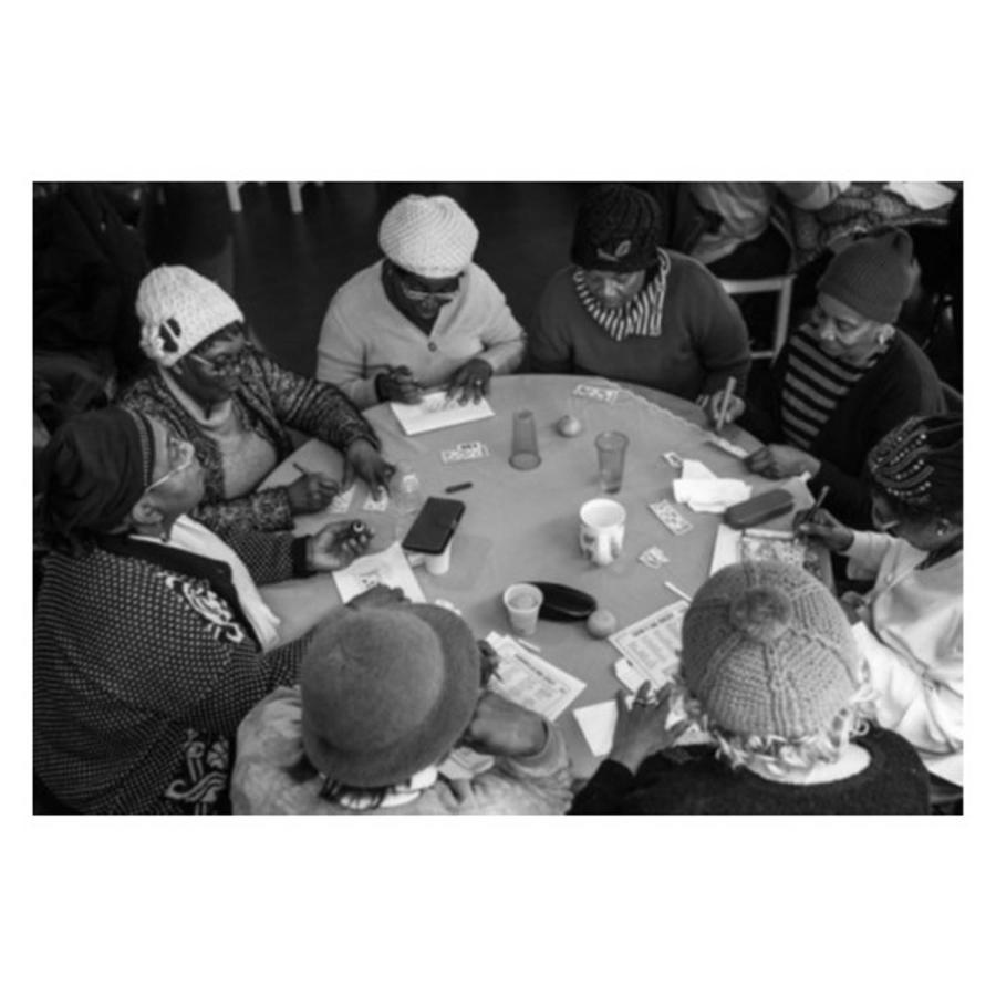 a group of women sitting and having fun