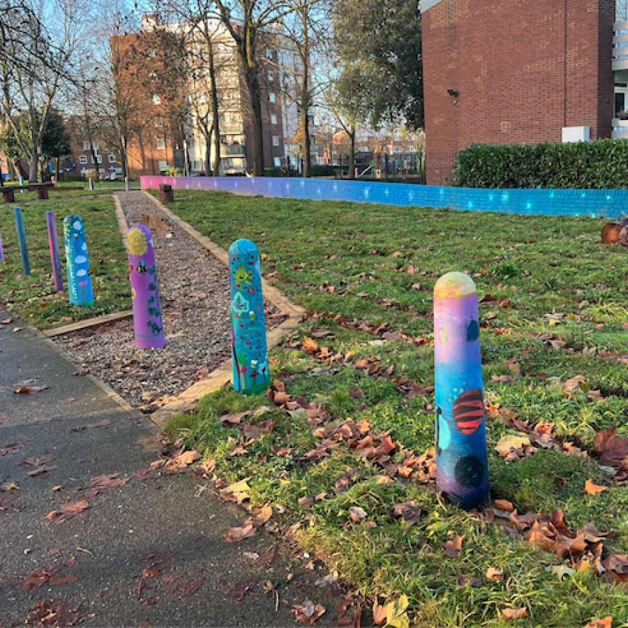 View of Huggins Corner showing colourful road bollards