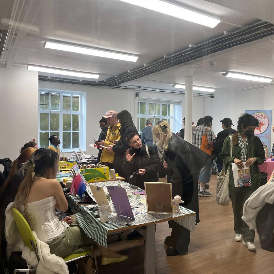 a copy of various people in a library exhibition
