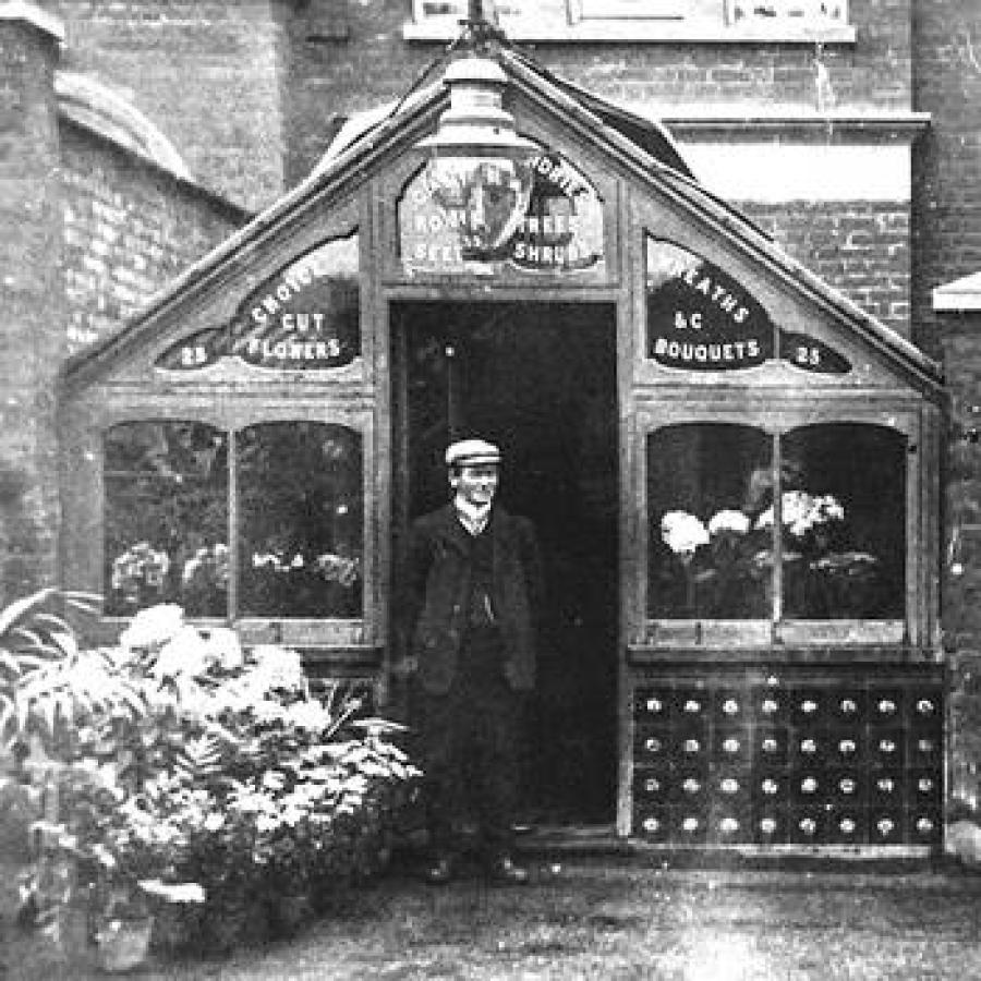 A man standing in front of a building