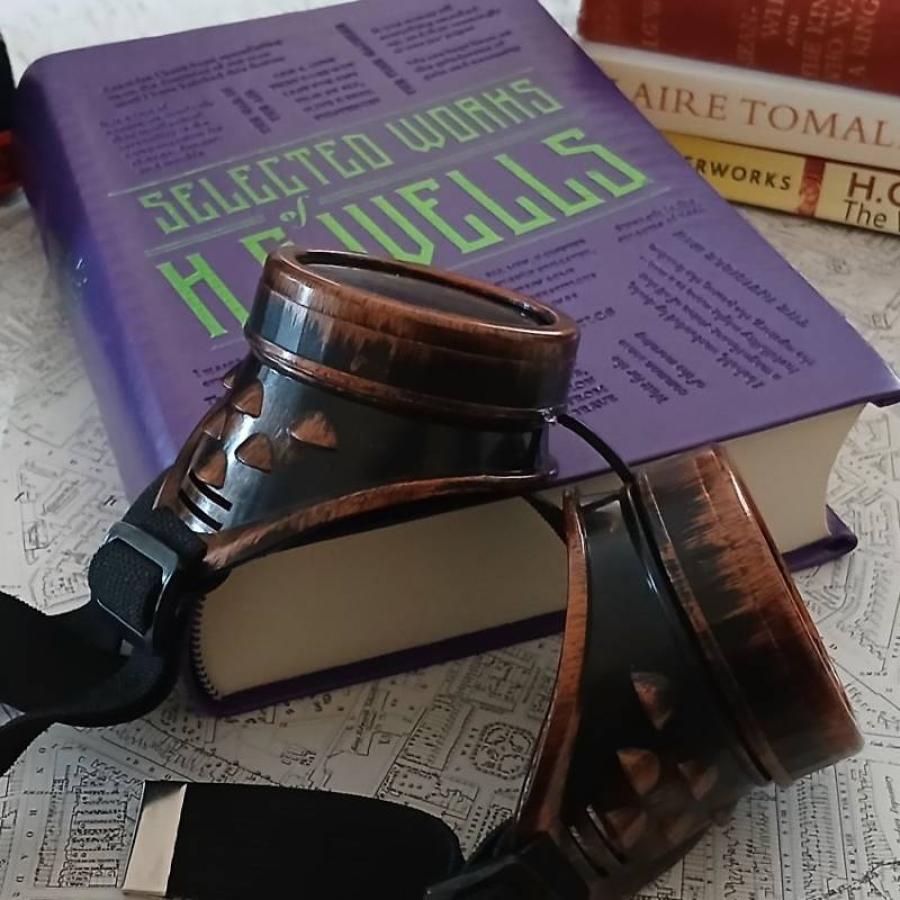 Magnifying glass with books
