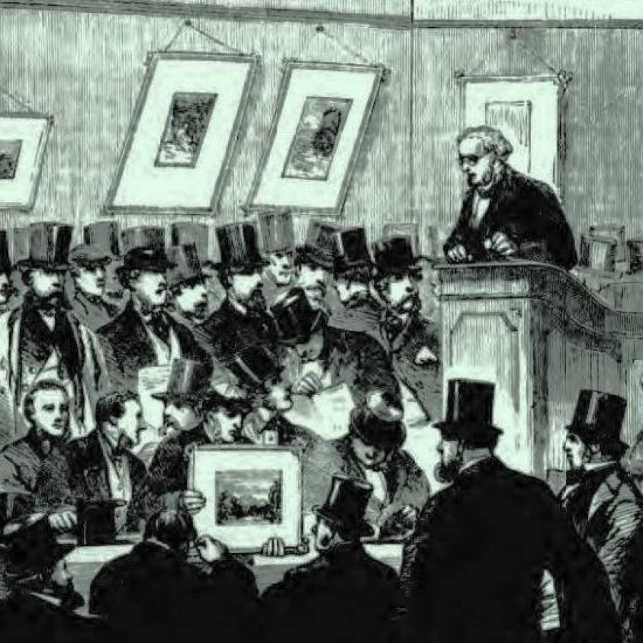 People participating in an auction in a warehouse