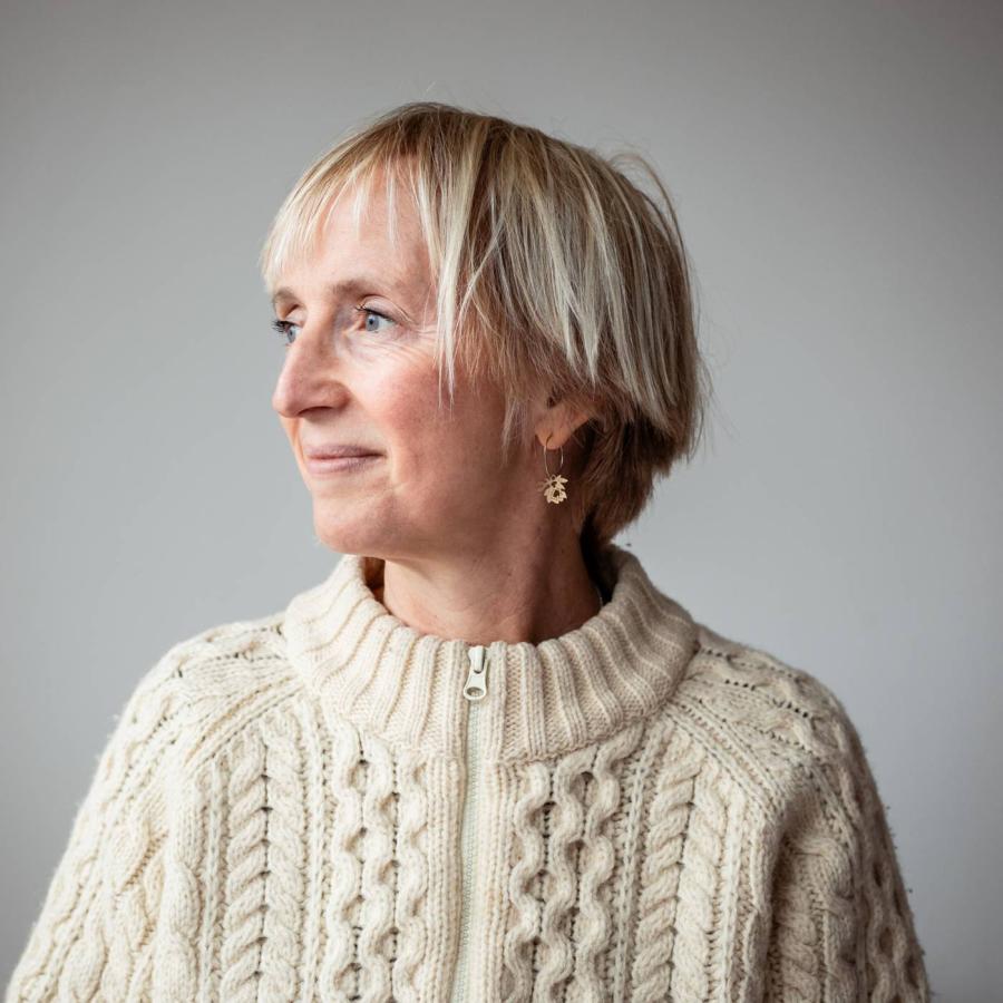 A photo of Julia looking at something.