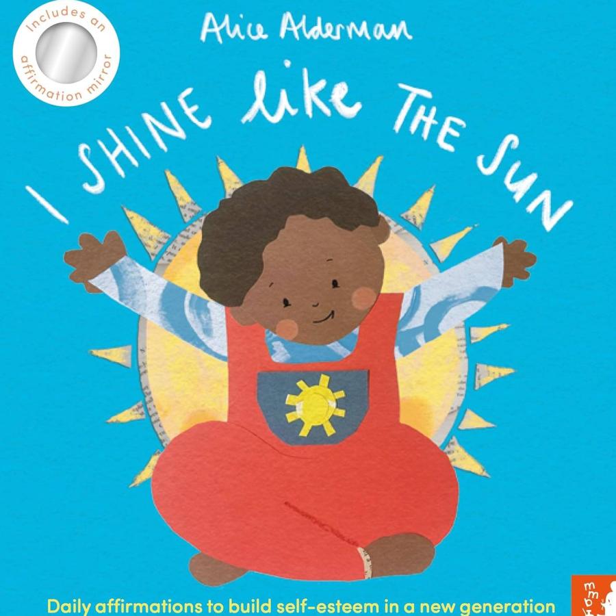 a happy child sitting on the floor