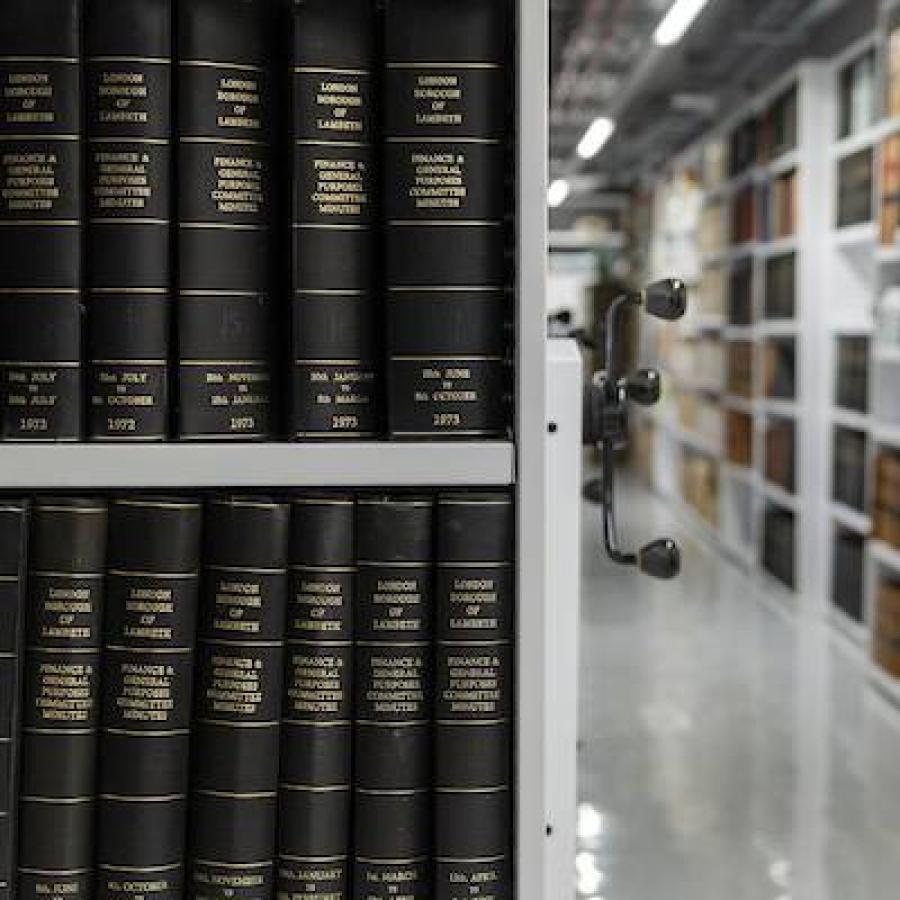 Various books in Archives rolling stack