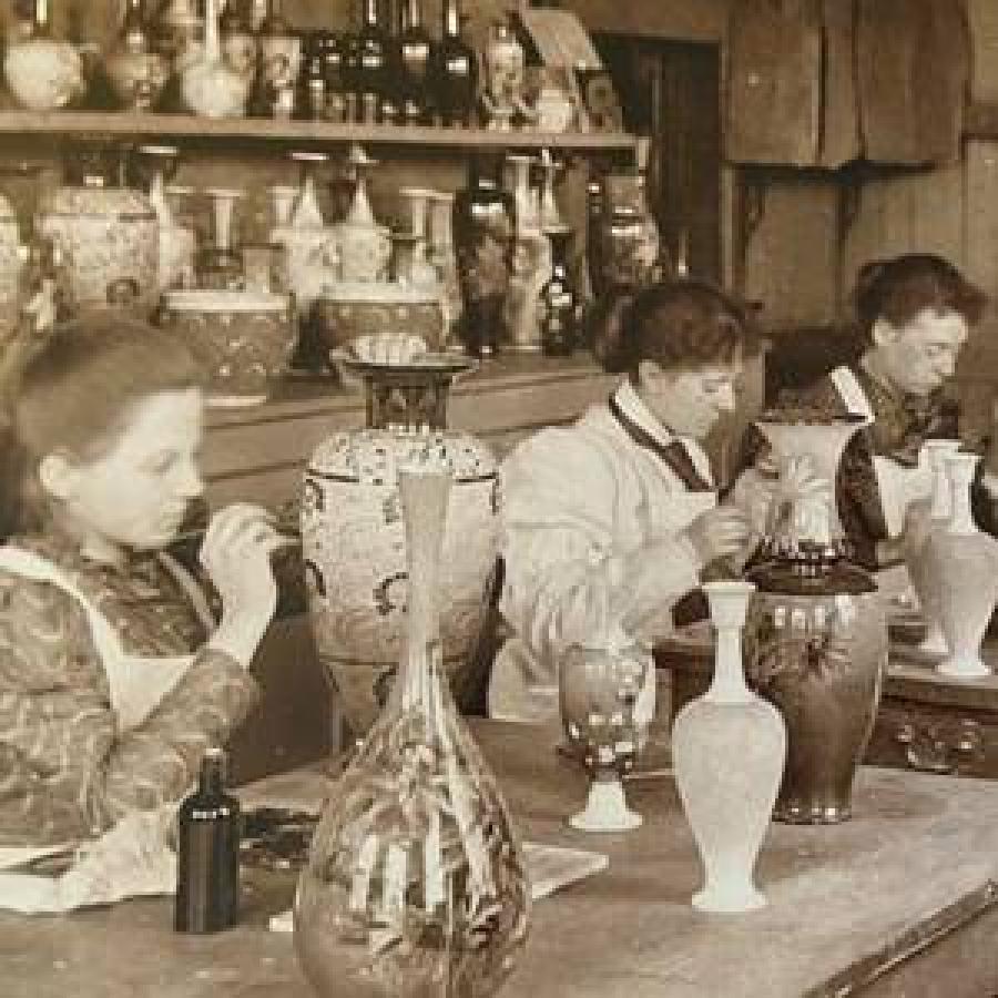 Women paiting a jars