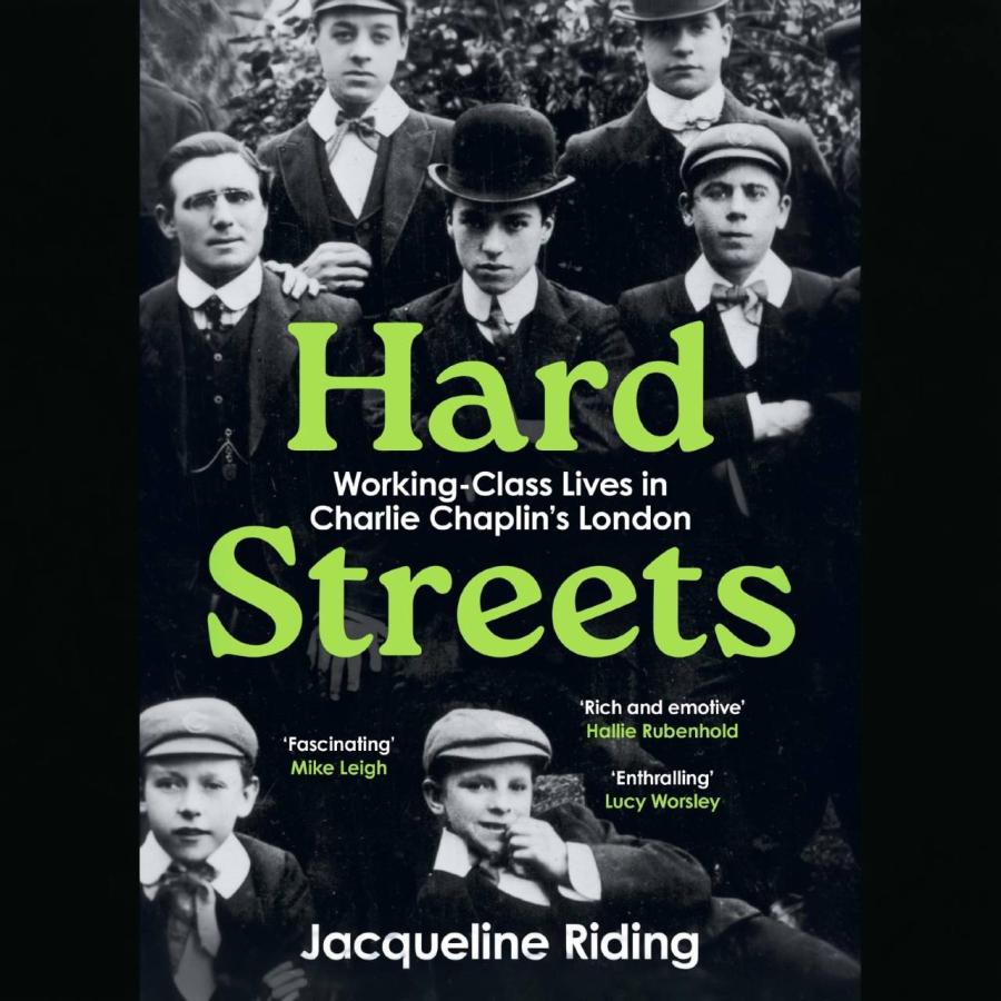 Vintage book cover featuring young men in formal attire, bold green title.