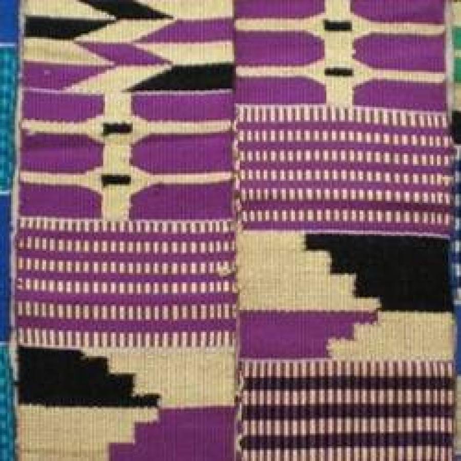 Colourful woven kente cloth pattern featuring geometric shapes and stripes.
