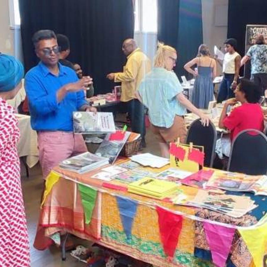 Various people attending a book fair.